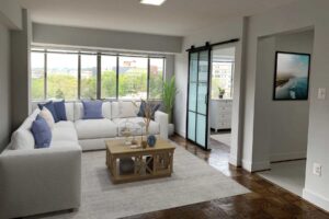 View of living and dining area in a furnished apartment at The Elise